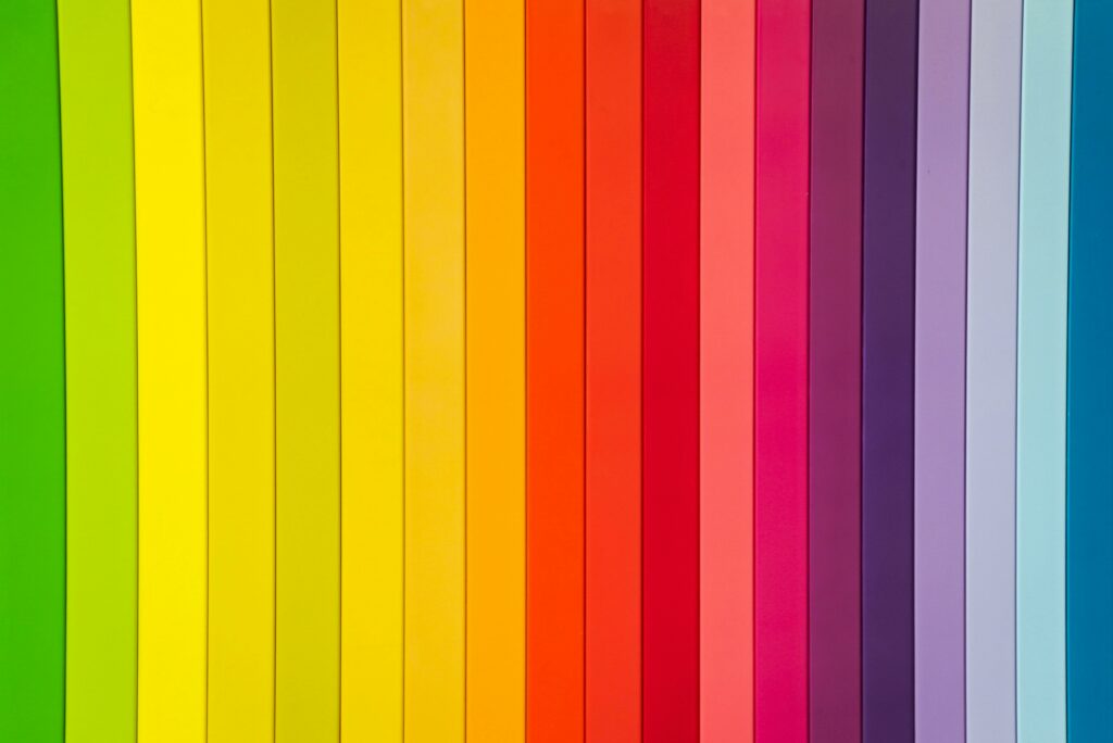 Blocks of color line up by gradient to form a rainbow.