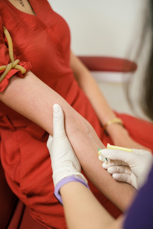 example of taking blood as a phlebotomist