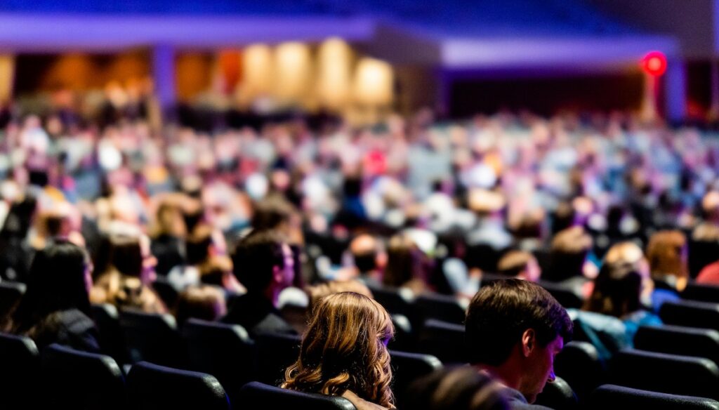 pexels-caleboquendo-11329860 emotional intelligence early bird promo post header image of conference crowd